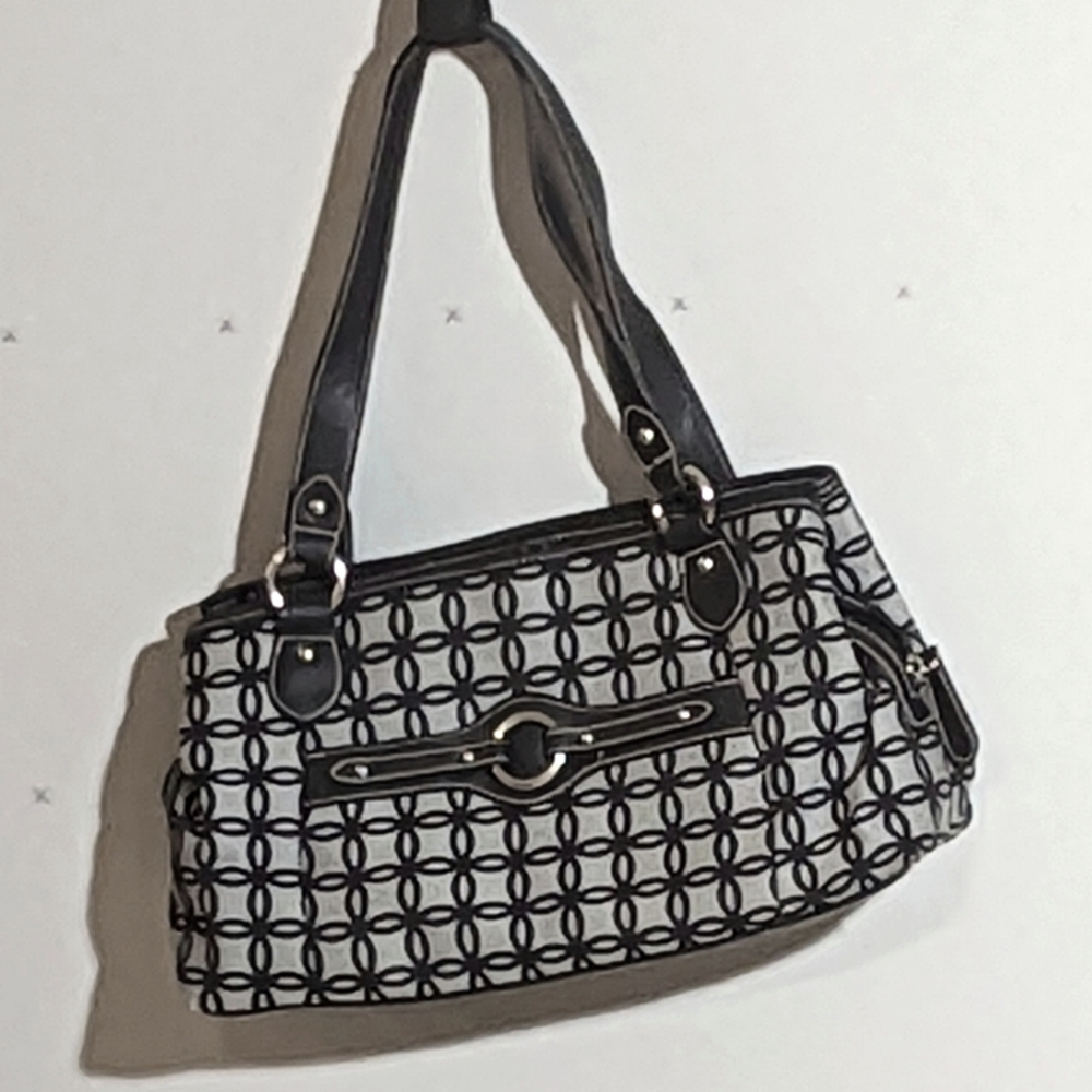 Croft & Barrow purse . Black man-made trim. Gray purse with black flower patLmor
